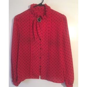 Red‎ with black polka dot blouse with cameo brooch